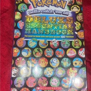 Pokemon Deluxe Essential Handbook by Scholastic Editors (2015)